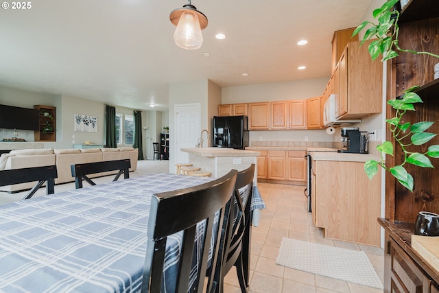 311 W Jadon Dr, Lebanon, OR 97355 - dining area featuring recessed lighting and light tile patterned floors