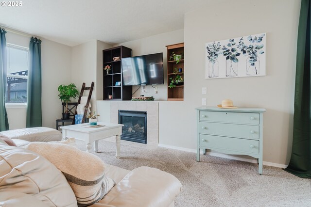 311 W Jadon Dr, Lebanon, OR 97355 - carpeted living room featuring a tile fireplace and baseboards