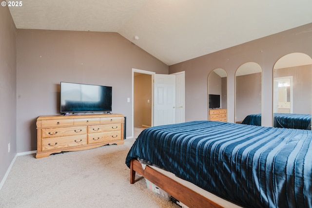 311 W Jadon Dr, Lebanon, OR 97355 - bedroom with lofted ceiling, carpet, baseboards, and arched walkways
