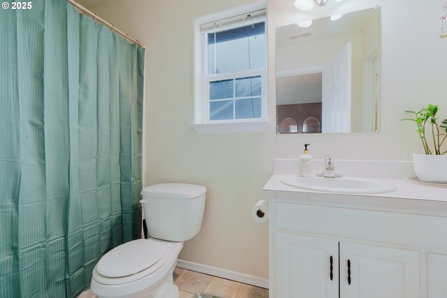 311 W Jadon Dr, Lebanon, OR 97355 - bathroom featuring vanity, toilet, baseboards, tile patterned floors, and a shower with curtain