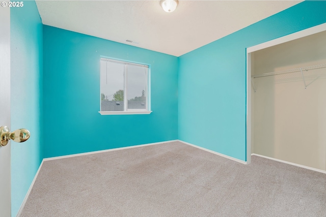 311 W Jadon Dr, Lebanon, OR 97355 - unfurnished bedroom with carpet floors, baseboards, and a closet