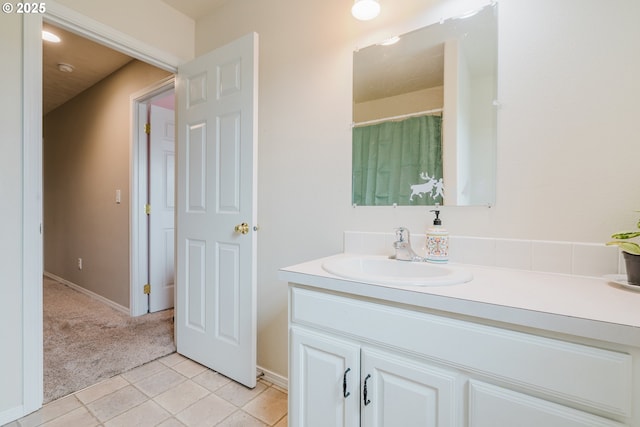 311 W Jadon Dr, Lebanon, OR 97355 - bathroom with vanity, tile patterned flooring, and baseboards