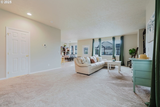 311 W Jadon Dr, Lebanon, OR 97355 - living area featuring carpet flooring, baseboards, and recessed lighting