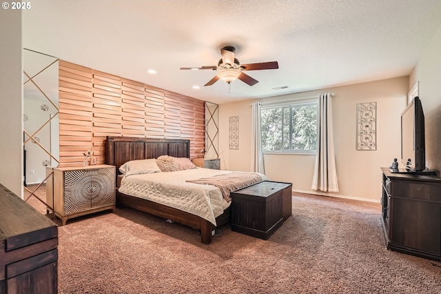 bedroom featuring recessed lighting, carpet flooring, ceiling fan, visible vents, and baseboards