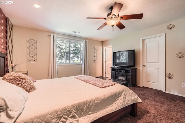 bedroom with recessed lighting, dark colored carpet, baseboards, visible vents, and a ceiling fan