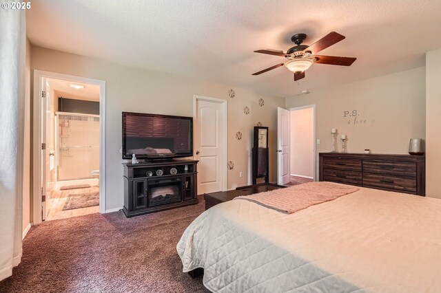 bedroom featuring ceiling fan, carpet floors, and ensuite bathroom