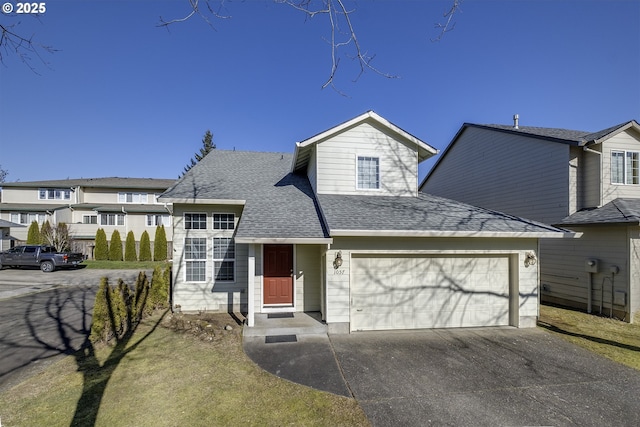 view of front of property with a garage