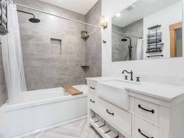 full bathroom featuring shower / bath combo and vanity