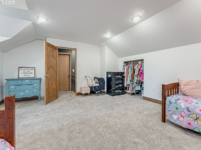 carpeted bedroom featuring lofted ceiling, baseboards, and recessed lighting