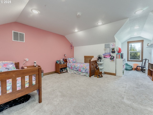 bedroom with lofted ceiling, visible vents, and recessed lighting