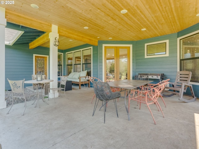 view of patio / terrace with outdoor dining area and french doors