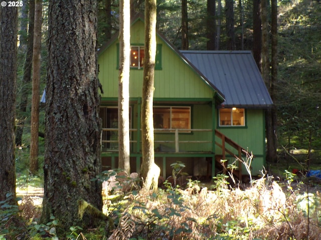 exterior space featuring metal roof