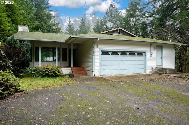 ranch-style home with a garage