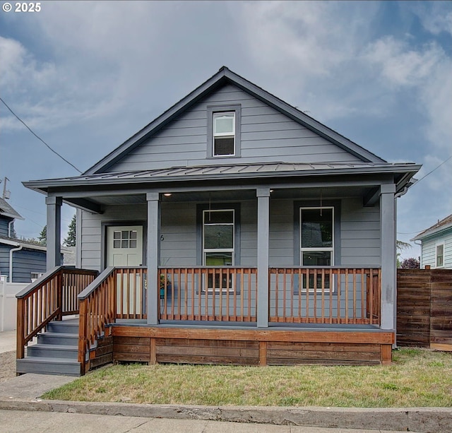 126 NE Garfield St, Camas, WA 98607 - view of front of house with a standing seam roof, covered porch, and a metal roof