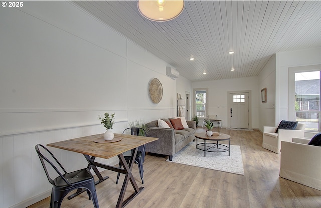 126 NE Garfield St, Camas, WA 98607 - living room featuring light wood-style floors, a wainscoted wall, wooden ceiling, recessed lighting, and a decorative wall
