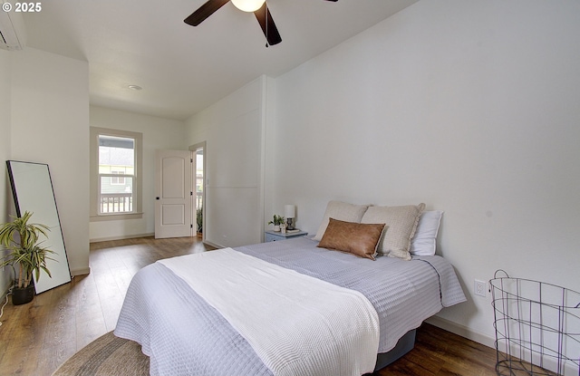 126 NE Garfield St, Camas, WA 98607 - bedroom featuring wood finished floors, ceiling fan, and a wall unit AC