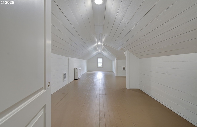 126 NE Garfield St, Camas, WA 98607 - additional living space with vaulted ceiling, wooden walls, wooden ceiling, and light wood-style flooring