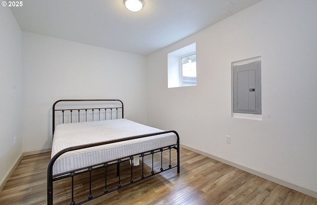 126 NE Garfield St, Camas, WA 98607 - bedroom featuring electric panel and wood finished floors