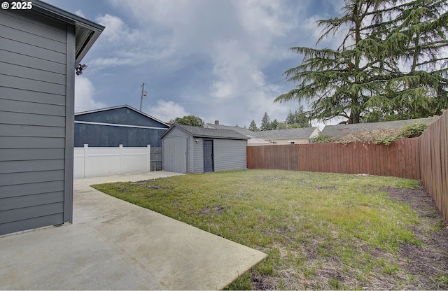 126 NE Garfield St, Camas, WA 98607 - fenced backyard with a patio and a storage shed