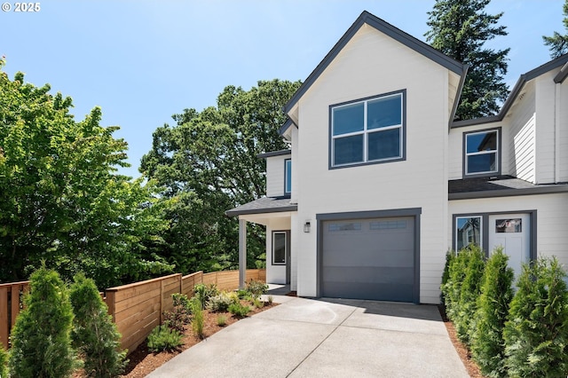 9258 SW Waverly Dr, Tigard, OR 97224 - view of front of home with a garage, driveway, and roof with shingles