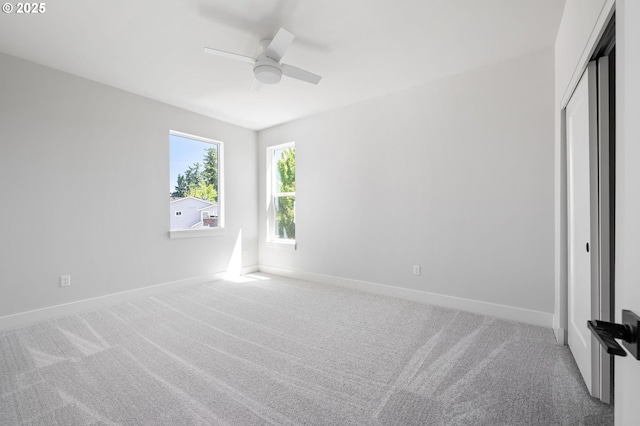 9258 SW Waverly Dr, Tigard, OR 97224 - unfurnished bedroom with carpet, baseboards, and a closet