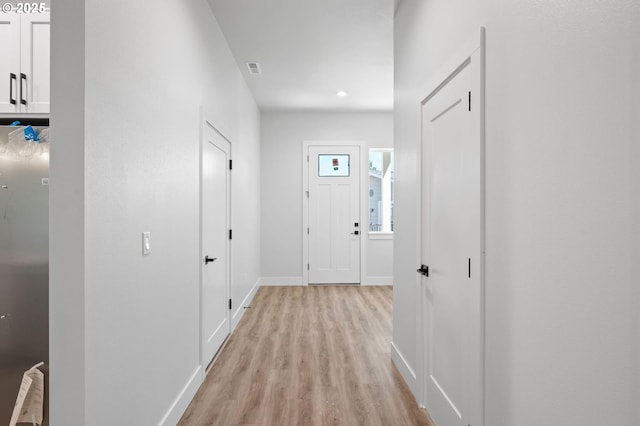9258 SW Waverly Dr, Tigard, OR 97224 - hall featuring light wood-style floors, baseboards, and recessed lighting