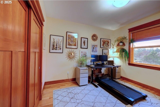 office space with light wood-type flooring