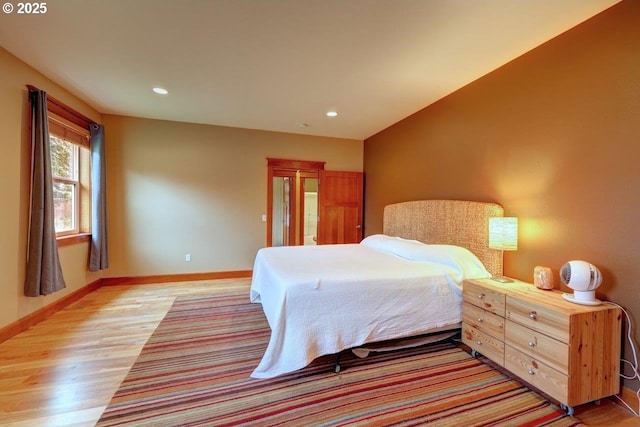 bedroom featuring light hardwood / wood-style floors