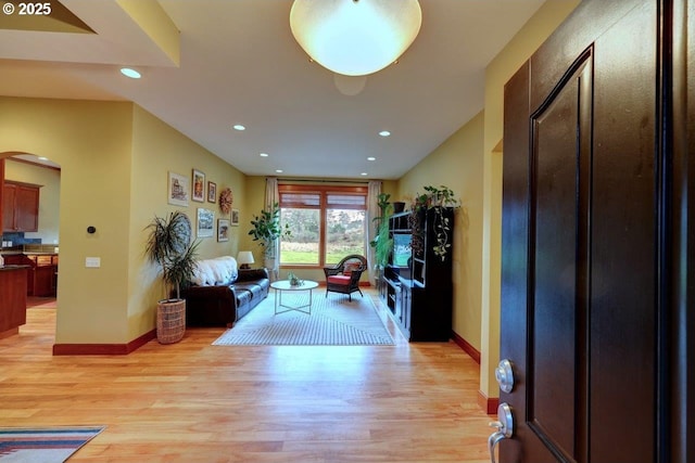 living room with light hardwood / wood-style floors