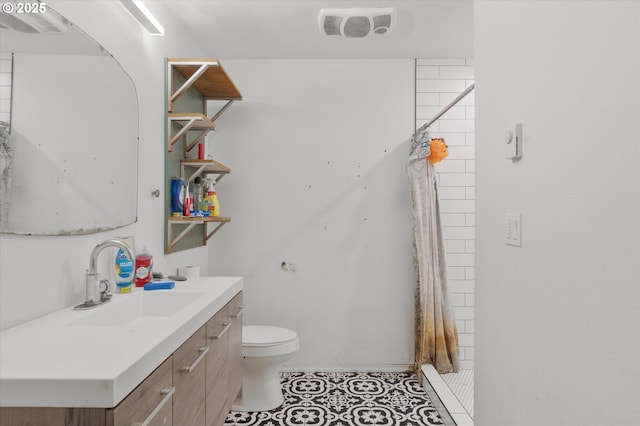 bathroom with visible vents, toilet, tile patterned flooring, vanity, and a shower stall