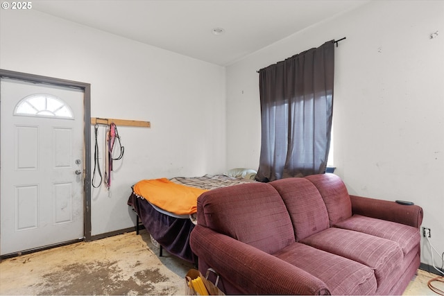 living room featuring concrete floors