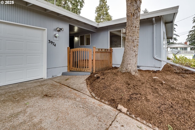 entrance to property with an attached garage