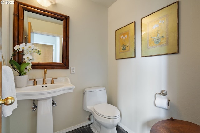 11442 SW Woodlee Heights Ct, Portland, OR 97219 - bathroom with toilet and baseboards