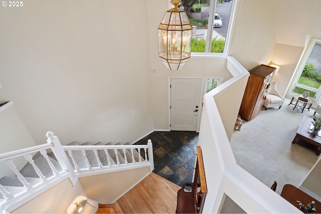 11442 SW Woodlee Heights Ct, Portland, OR 97219 - foyer with a high ceiling, plenty of natural light, and stairway