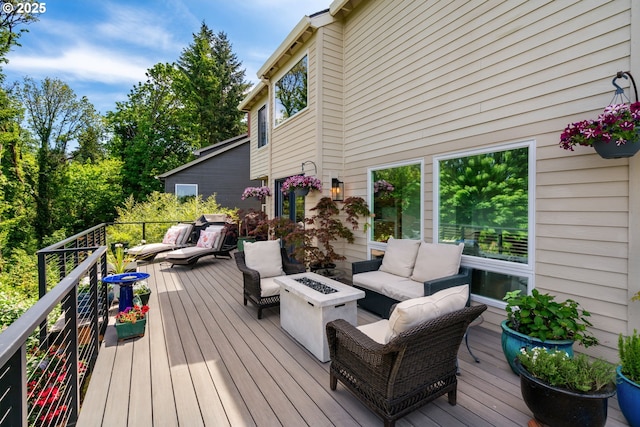 11442 SW Woodlee Heights Ct, Portland, OR 97219 - deck featuring an outdoor living space with a fire pit