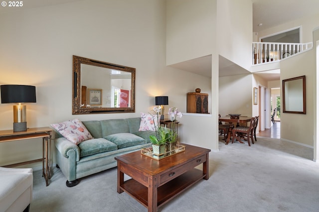 11442 SW Woodlee Heights Ct, Portland, OR 97219 - carpeted living room with a towering ceiling