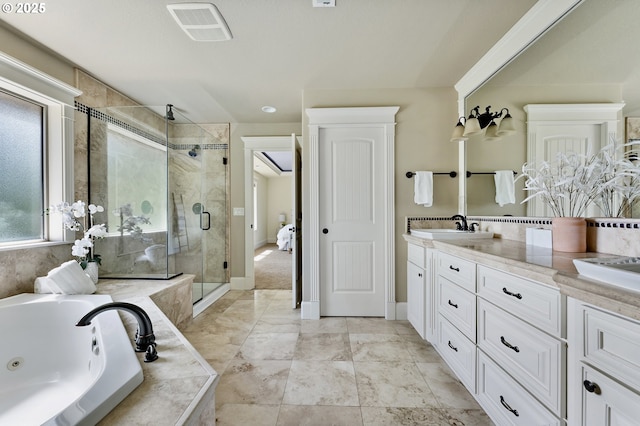7102 SW 78th Ave, Portland, OR 97223 - bathroom featuring a stall shower, a tub with jets, double vanity, and baseboards