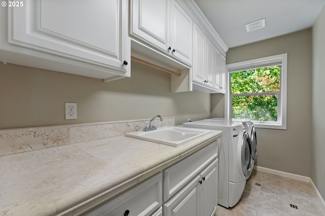 7102 SW 78th Ave, Portland, OR 97223 - laundry room featuring cabinet space, independent washer and dryer, and baseboards