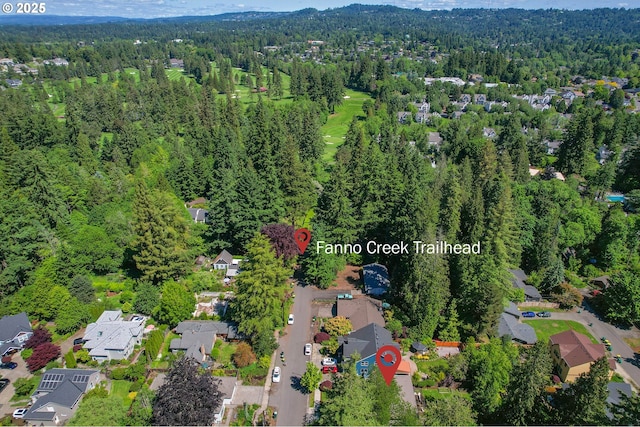 7102 SW 78th Ave, Portland, OR 97223 - aerial overview of property's location featuring a forest and nearby suburban area