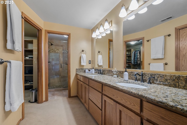 3003 NE 164th St, Ridgefield, WA 98642 - full bath with a shower stall, a walk in closet, and double vanity