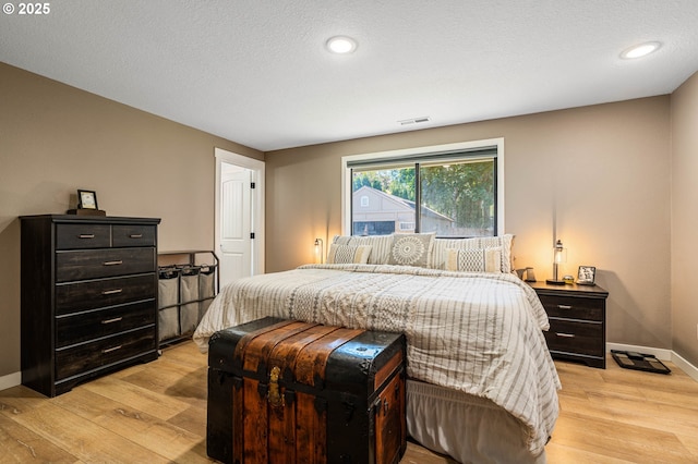 3817 NW Mccann Rd, Vancouver, WA 98685 - bedroom featuring light wood-style flooring and recessed lighting
