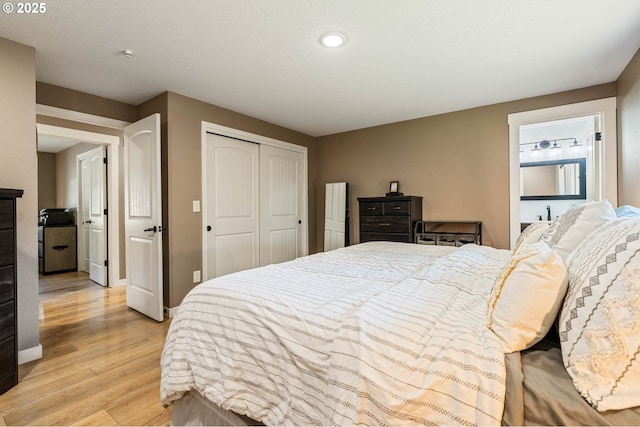 3817 NW Mccann Rd, Vancouver, WA 98685 - bedroom with light wood finished floors and a closet