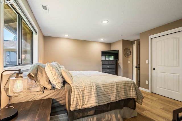 3817 NW Mccann Rd, Vancouver, WA 98685 - bedroom featuring light wood-style flooring and recessed lighting
