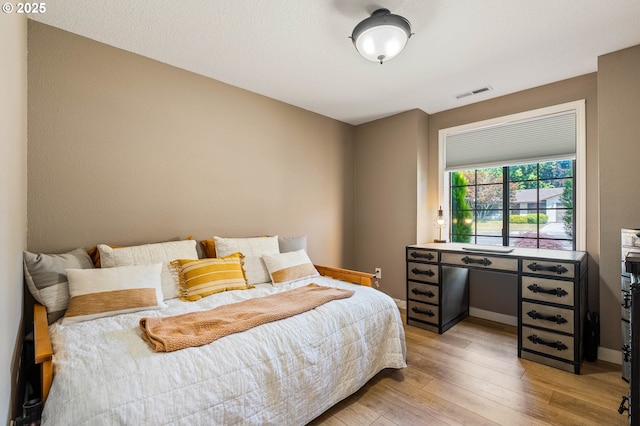 3817 NW Mccann Rd, Vancouver, WA 98685 - bedroom with light wood-type flooring and baseboards