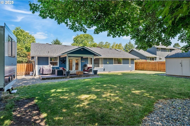 3817 NW Mccann Rd, Vancouver, WA 98685 - back of house with a shed, a patio area, a fenced backyard, and a shingled roof