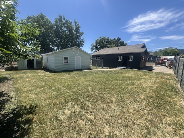 1801 Jackson Ave, La Grande, OR 97850 - rear view of property featuring an outdoor structure