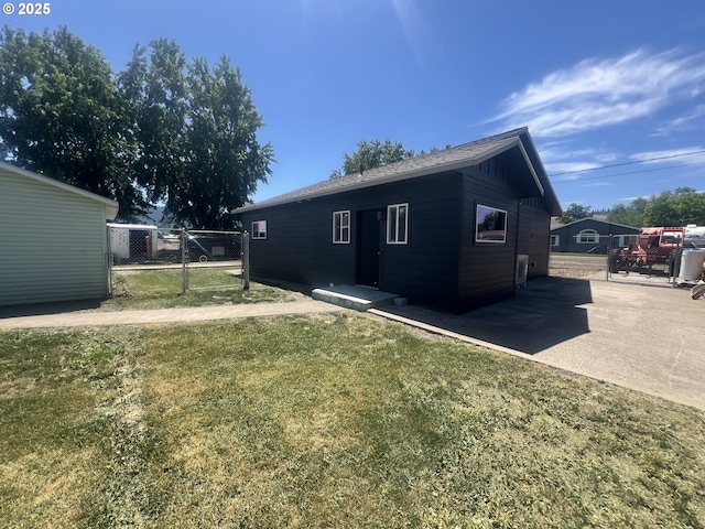 1801 Jackson Ave, La Grande, OR 97850 - rear view of house featuring a gate