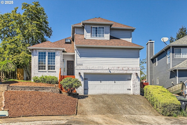 22585 SW 87th Pl, Tualatin, OR 97062 - view of front of home featuring concrete driveway, an attached garage, roof with shingles, and brick siding