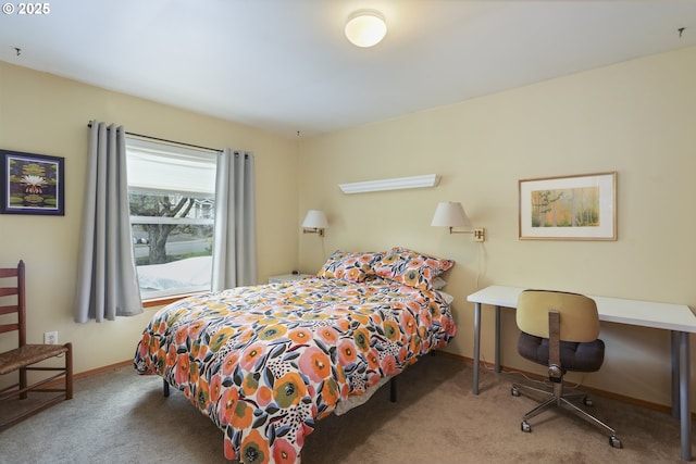 carpeted bedroom with baseboards