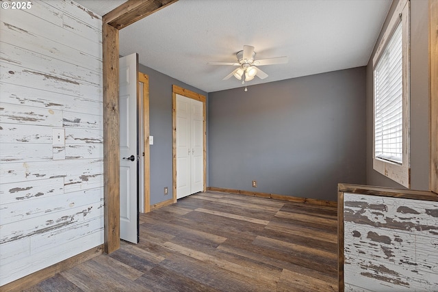 20694 SW Parker Ct, Beaverton, OR 97078 - unfurnished room with a ceiling fan, plenty of natural light, and dark wood finished floors
